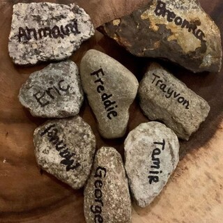 Rocks with the names of African Americans killed by police violence