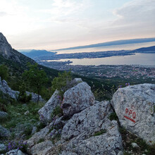 View from Kozjak mountain to Split with trail sign "PPD" (sometimes only "D").