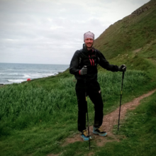 Damian Hall along the South West Coast Path, photo by Tom Jones / Contours Trail Running Holidays